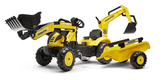 Tractopelle Komatsu avec excavatrice et remorque