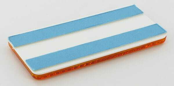 Pièces agricoles - Eclairage - Catadioptre rectangle orange 94x44mm autocollant Hella
