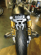 Support de plaque ACCESS DESIGN passage de roue noir Triumph Thruxton 1200